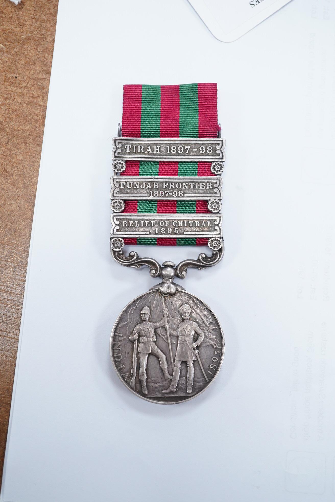 An India General Service medal 1895-1902 awarded to 4695 Pte J Wood 2nd, 13th King's Own Scottish Borders, with Tireh 1897-98, Punjab frontier 1897-98 and relief of Chitral 1895 clasps. Condition - fair to good